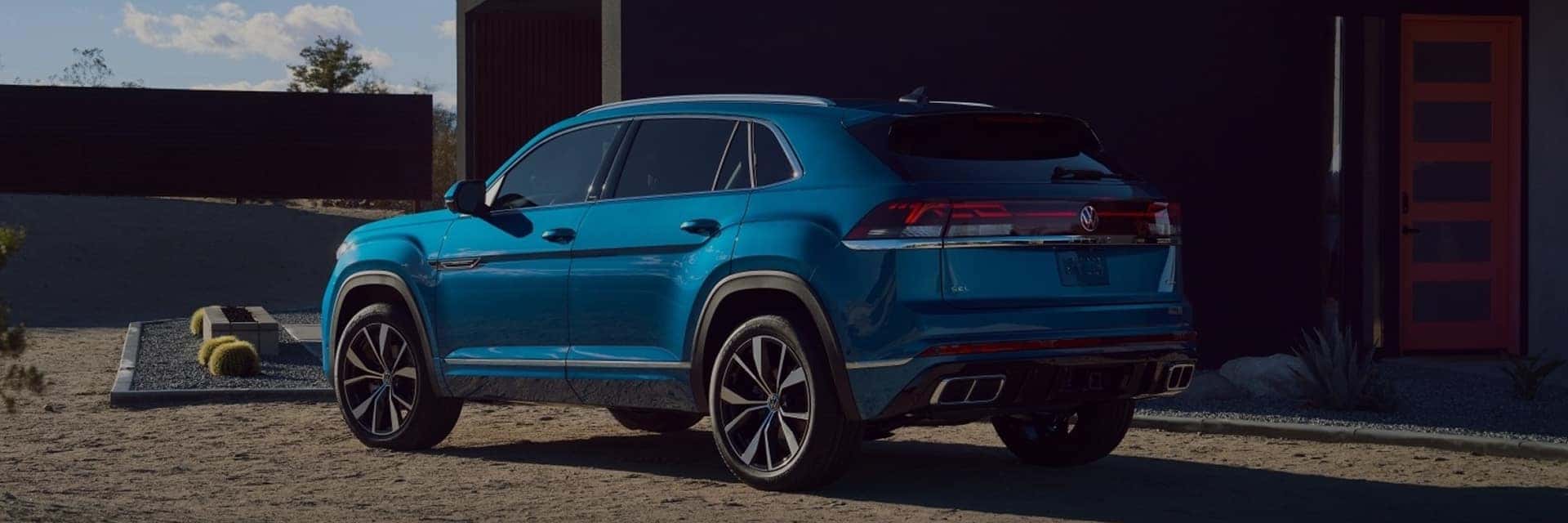blue 2025 atlas cross sport parked