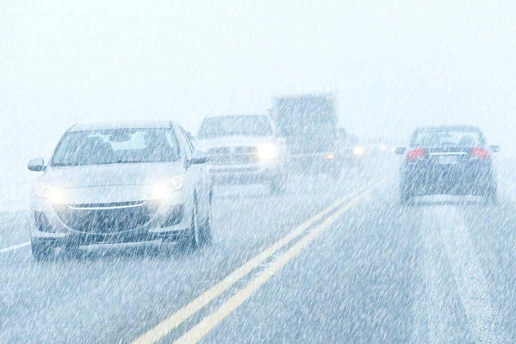 Cars driving in heavy snow