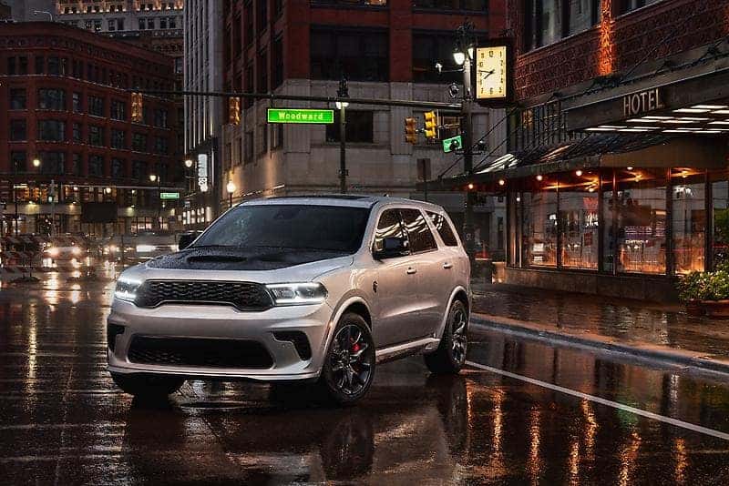 2025 Dodge Durango parked in the dark in the middle of a city