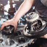 RAM service technician working on a transmission