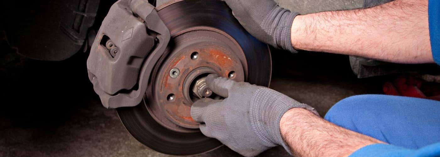 Mechanic Changing Brakes