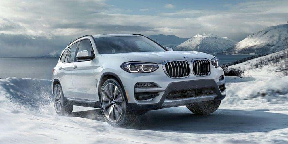 White 2020 BMW X3 on Snowy Road
