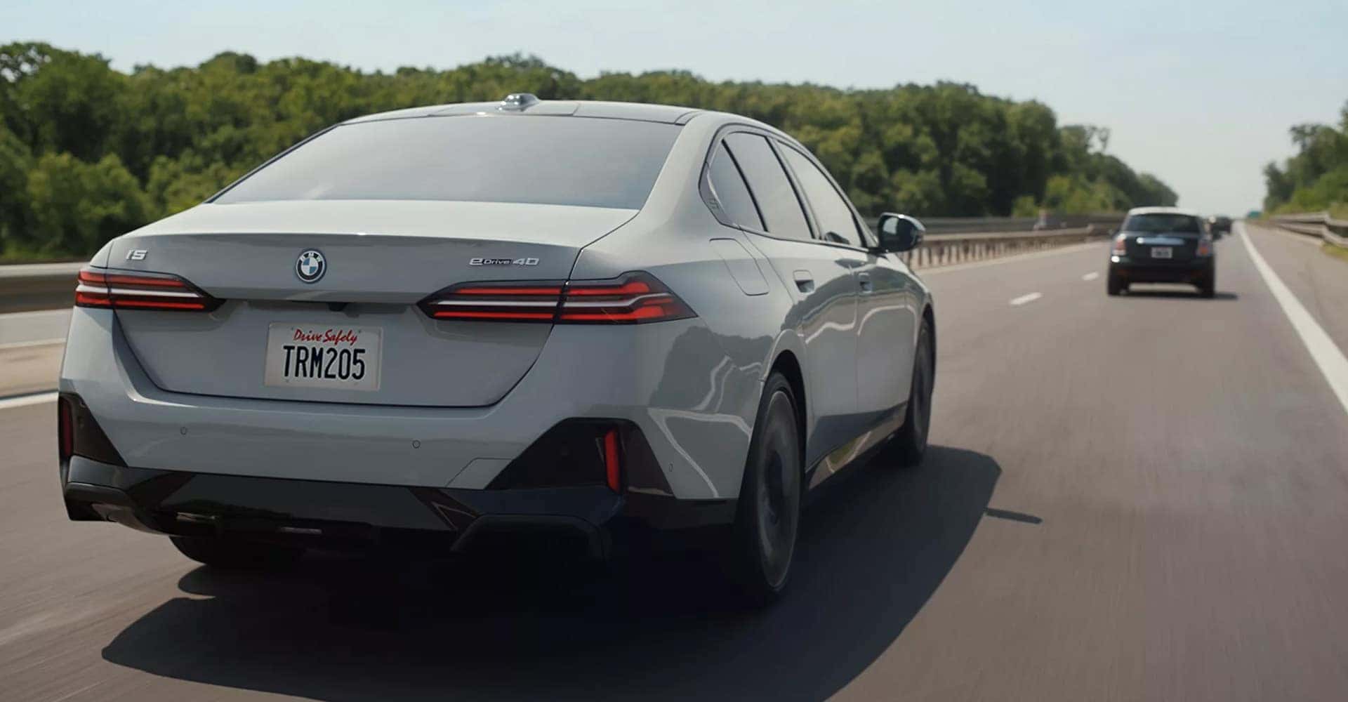BMW i5 driving road