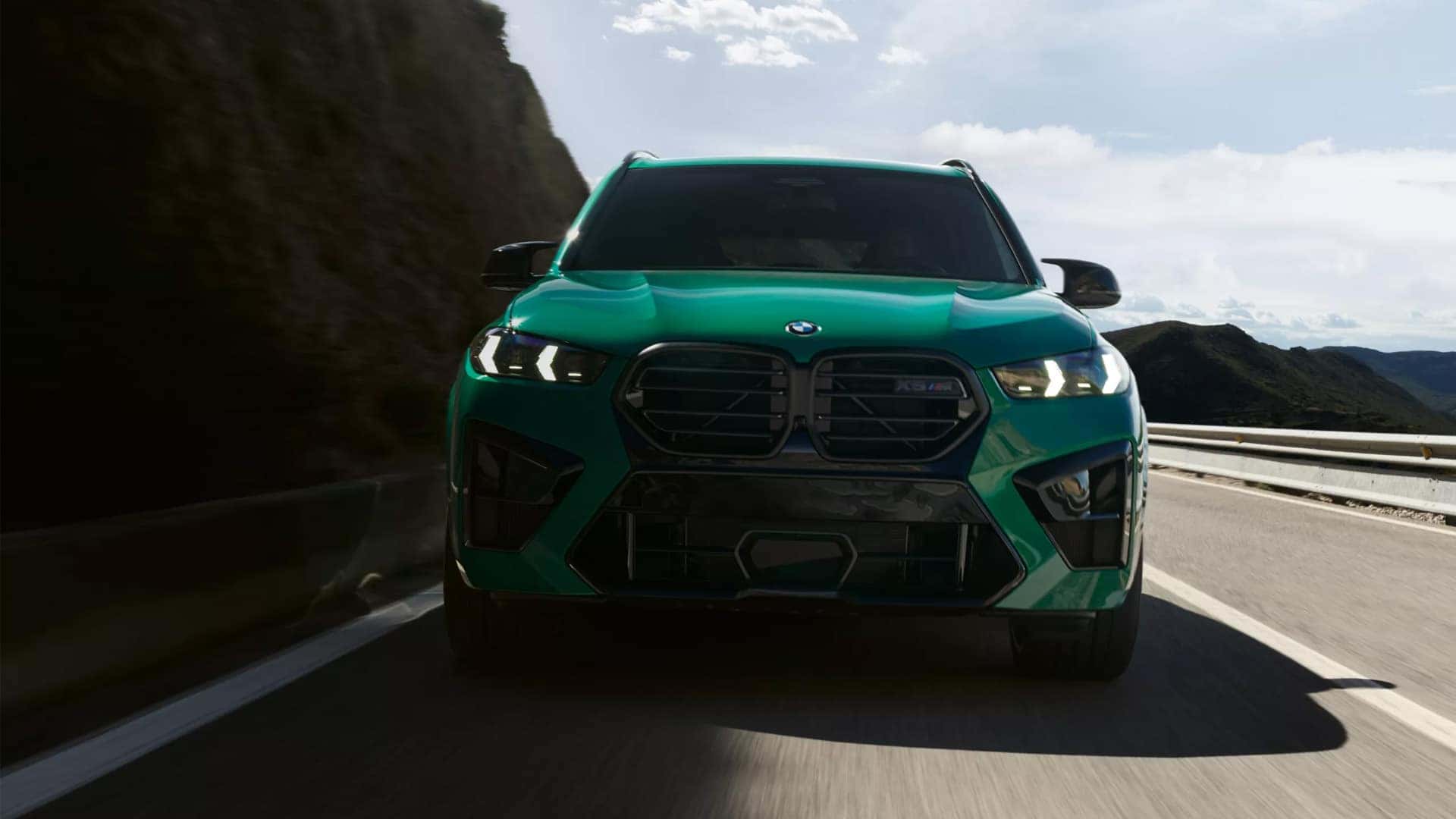 Front View of 2025 BMW X5 M Competition on the Road