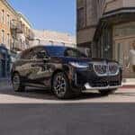Woman-Walking-in-Front-of-2026-BMW-X3