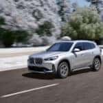 2026 BMW X1 driving on snowy road