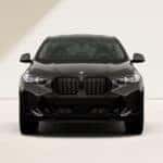 2026-BMW-X6-black-in-pale-room