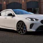 2026-BMW-2-white-sedan-side-view