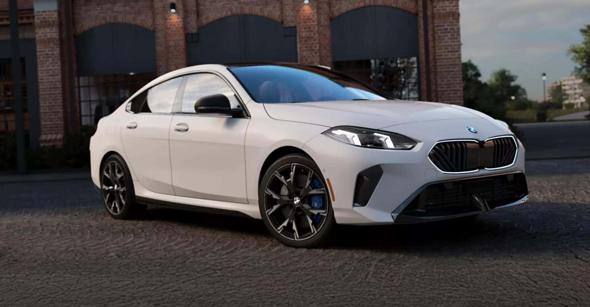 2026-BMW-2-white-sedan-side-view