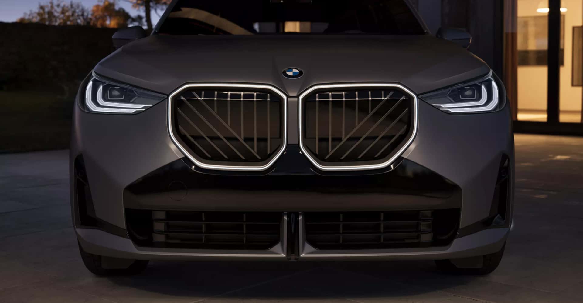 2026 BMW X3 front view at night