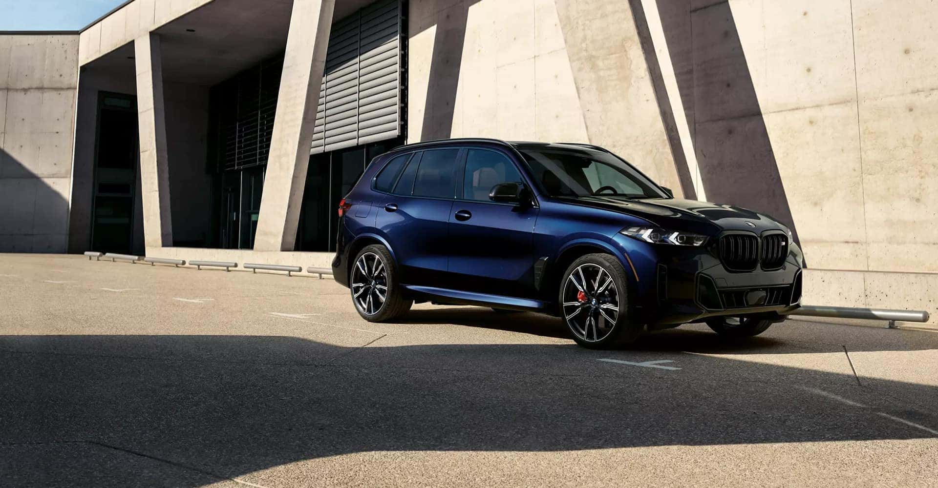 2026-BMW-X5M-blue-front-side