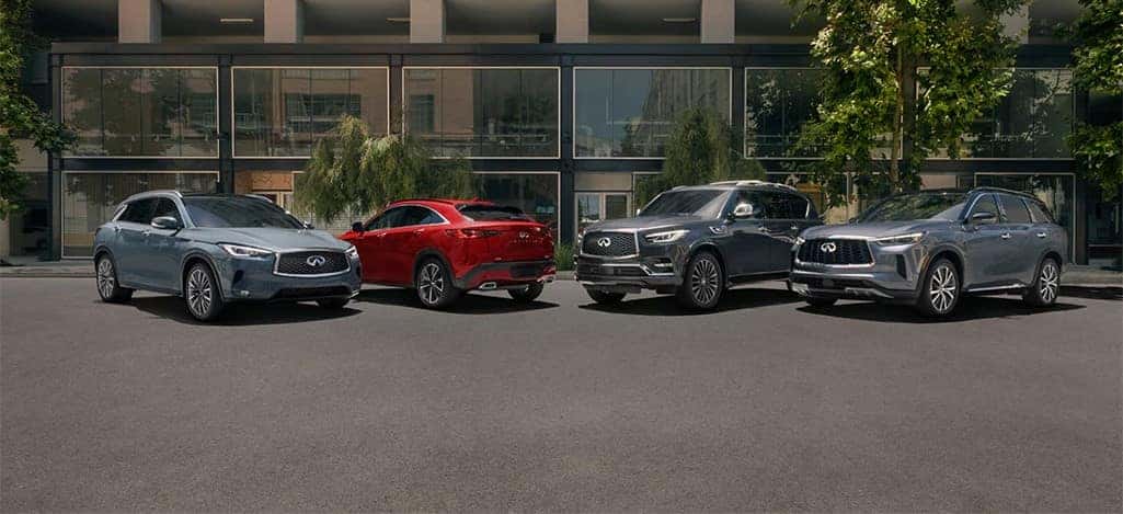 2024 INFINITI Crossover and SUV line up; QX60, QX55 and QX80 lined up near city parking lot