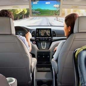 Family enjoying their ride in a 2024 Honda Odyssey, with a focus on the interior. Danville, CA
