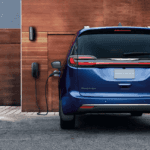 The 2021 Chrysler Pacifica Hybrid charging at home.