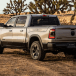 The RAM 1500 off-roading in a desert setting.