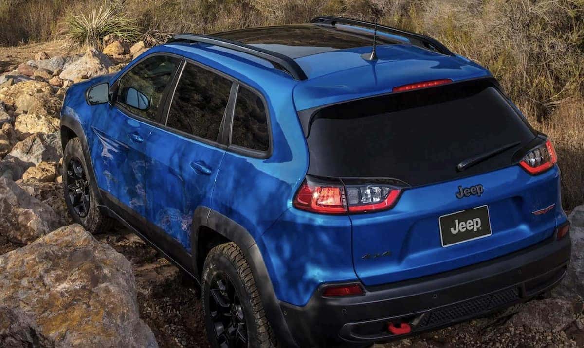 blue 2023 Jeep Cherokee Crawling