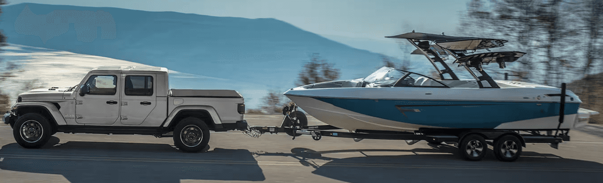 2023 Jeep Gladiator towing a boat
