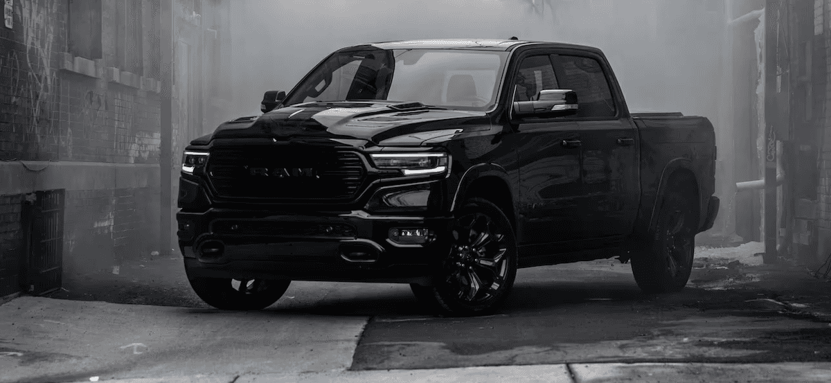 Black 2023 Ram 1500 with smoke in the background 