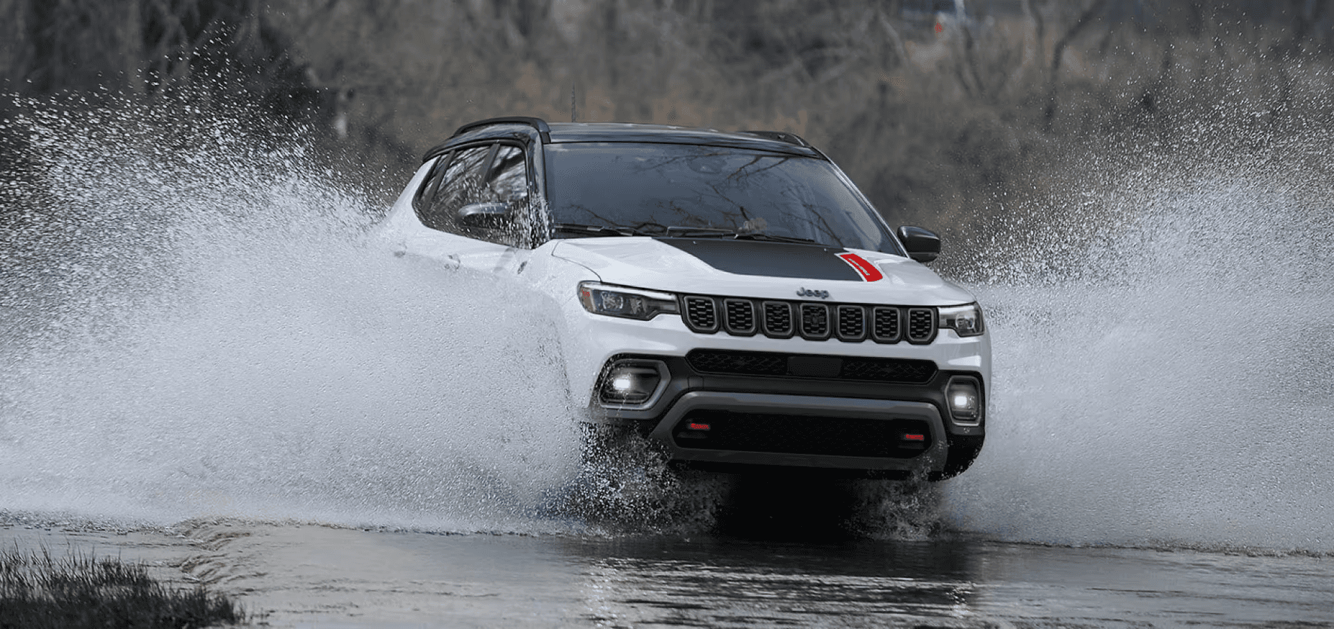 2024 Jeep Compass driving through water