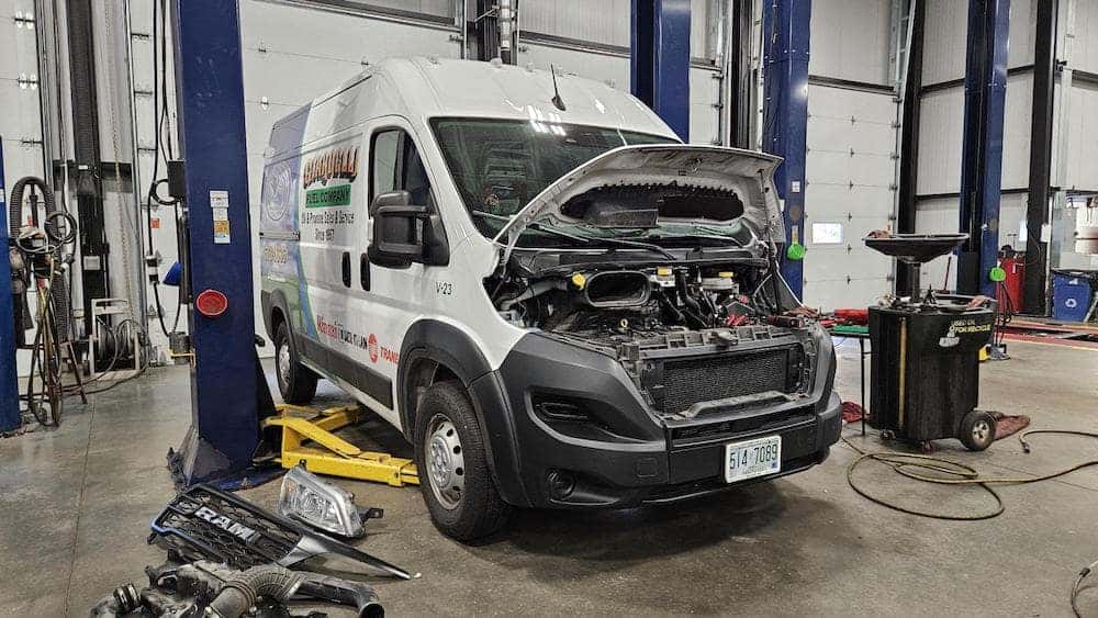 Fleet Service Repair at Contemporary Automotive in Milford RAM ProMaster Engine Being Serviced