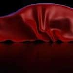 Car covered by a sheet