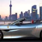 Ferrari Portofino M with a skyline in the background