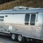 Exterior view of the 2021 RAM 1500 towing a trailer