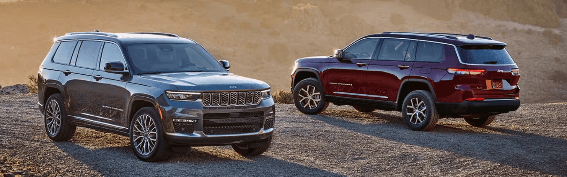 2024 Jeep Grand Cherokee Vehicles Parked on a Mountainside at Sunset