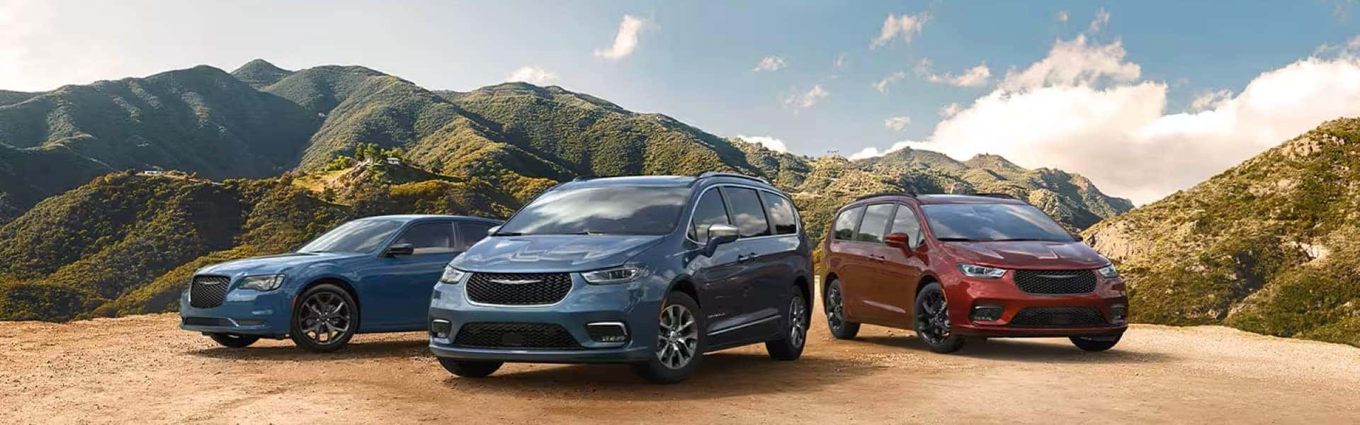 Certified Pre-Owned Chrysler Models Parked With Hills In The Background