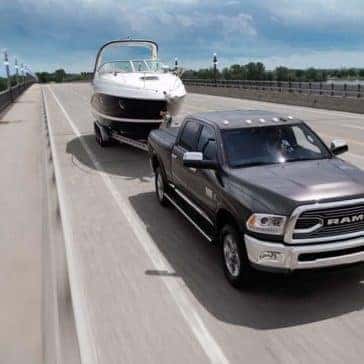 2018 RAM 1500 Limited towing a trailer on the highway