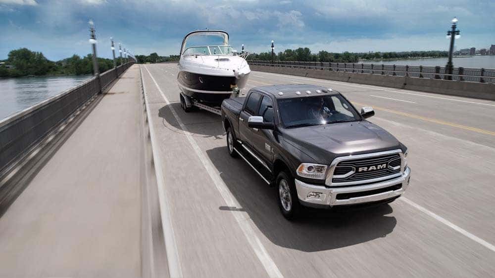 2018 RAM 1500 Limited towing a trailer on the highway