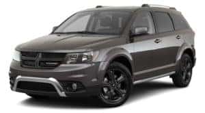 A dark grey 2020 Dodge Journey is angled left.