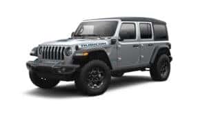 A silver 2021 Jeep Wrangler 4xe is angled left.