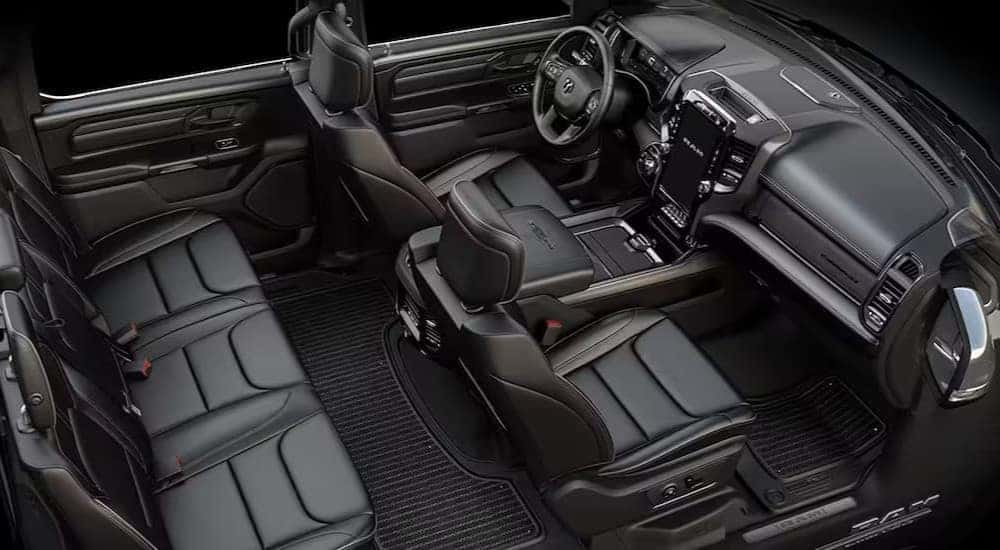 A high angle shot of the black interior of a 2024 Ram 1500.