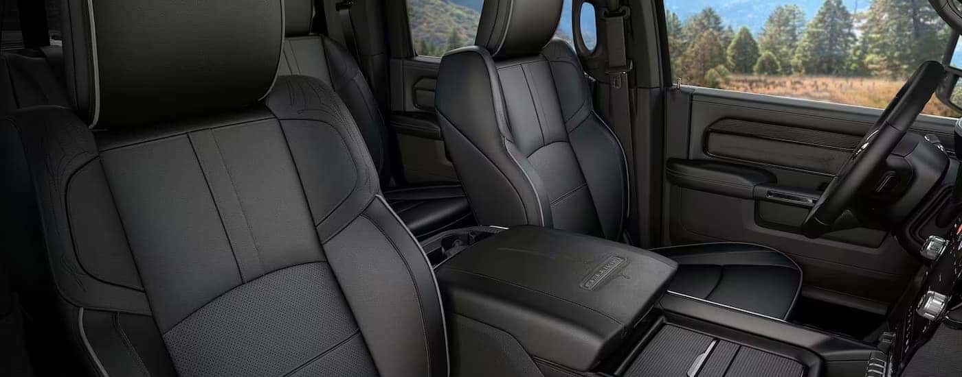 The black interior seats of a 2024 Ram 2500 Limited.