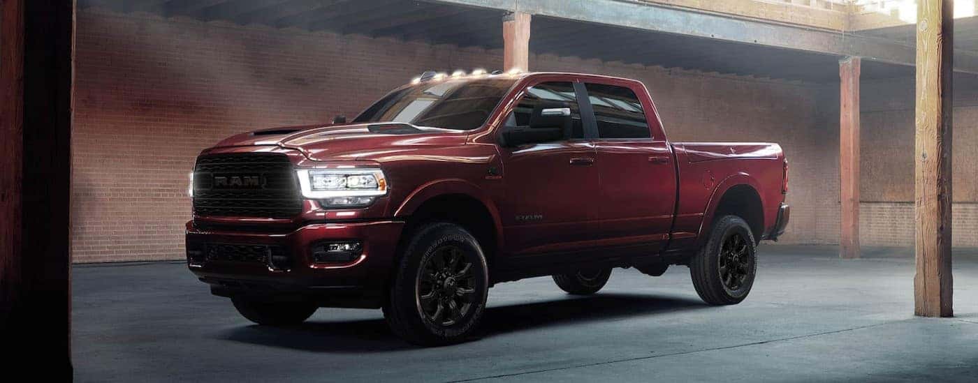 A red 2024 Ram 2500 for sale near Somerset is shown parked off-road.
