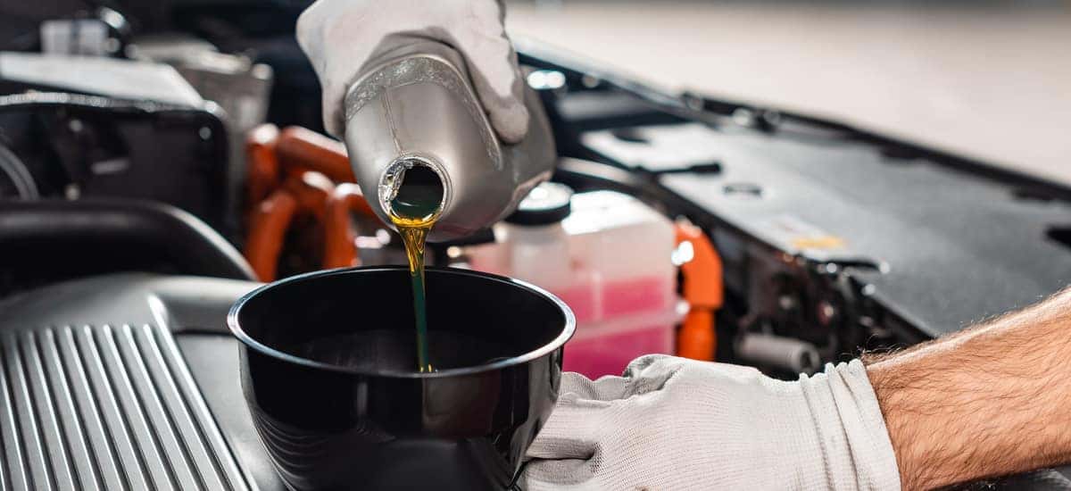 Mechanic Changing Oil