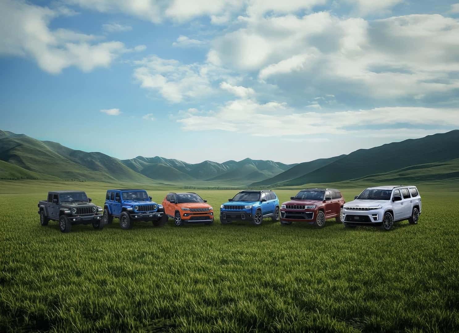 2027 Jeep vehicles next to a mountain landscape