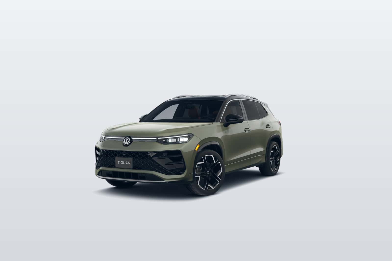 2026 Volkswagen Tiguan in Avocado Green parked in Denver, Colorado at Emich Volkswagen