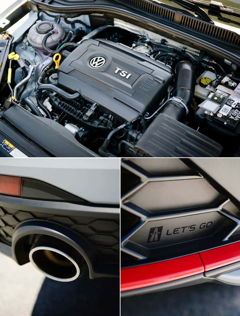 Volkswagen Jetta GLI Autobahn 2.0L TSI Engine with a black plastic cover under an open hood. Volkswagen Jetta GLI Autobahn Black Package dual exhaust and Autobahn LETS GO! grille badge exterior details on a close-up cropped view.