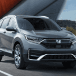 2020 Honda CR-V Hybrid version driving on highway bridge