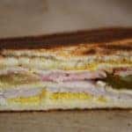 A cuban sandwich sitting on a table