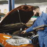 Mechanic Servicing a Car | INFINITI of Lafayette