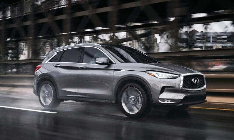2023 INFINITI QX50 driving on wet roads