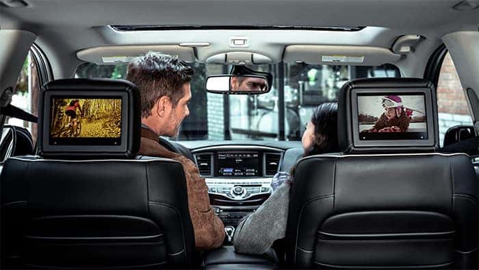 Couple driving in INFINITI QX60