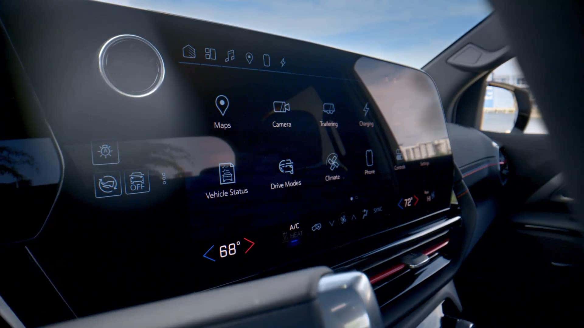 Infotainment screen of the Chevrolet Silverado EV displaying various vehicle controls and navigation options.