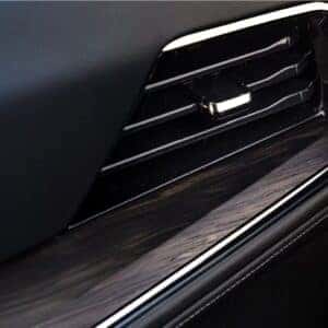 close up of vent with wood grain accents on chevy tahoe