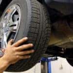mechanic changing a car wheel.
