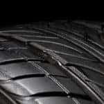 Car tire, photo on the black background