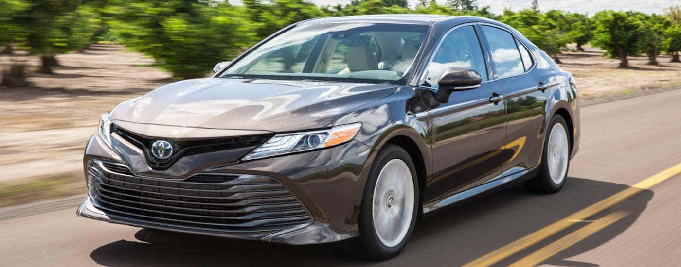 Grey 2018 Toyota Camry on a country road